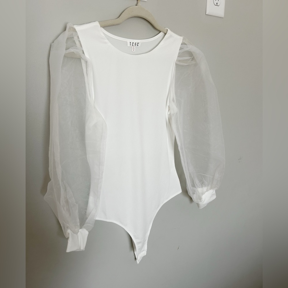 TCEC white body suit with puffed mesh sleeves